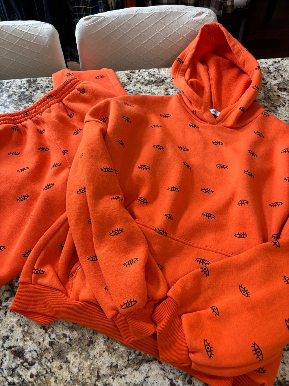 Adika Women’s Bright Orange Eye-Print Crewneck Hoodie and Pants set